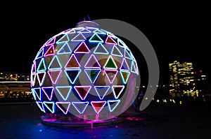 Christmas giant ball artwork sparkle light installation at Darling Harbour, Sydney Downtown at Night.